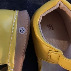 Yellow leather squeak shoes